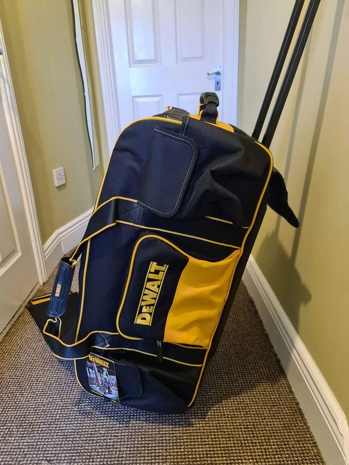 Dewalt tool bag with wheels new.